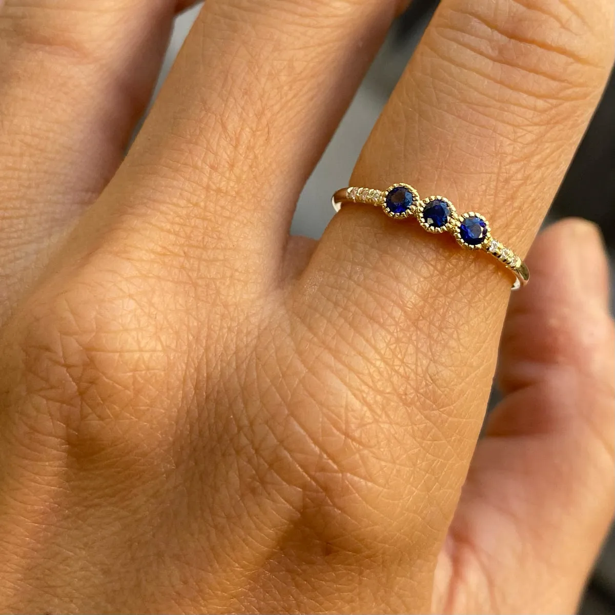 3 Bezel Blue Sapphire Equilibrium Ring